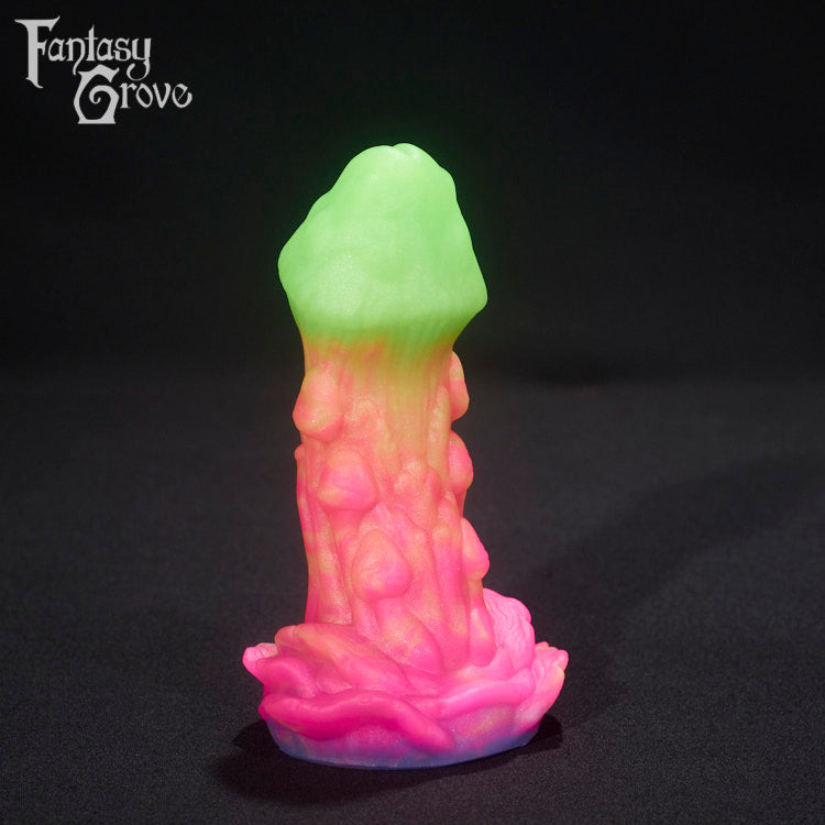 A fantasy sex toy on a black background with the Fantasy Grove logo in the upper left corner 