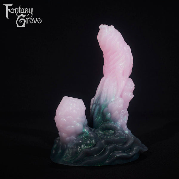 A fantasy sex toy on a black background with the Fantasy Grove logo in the upper left corner