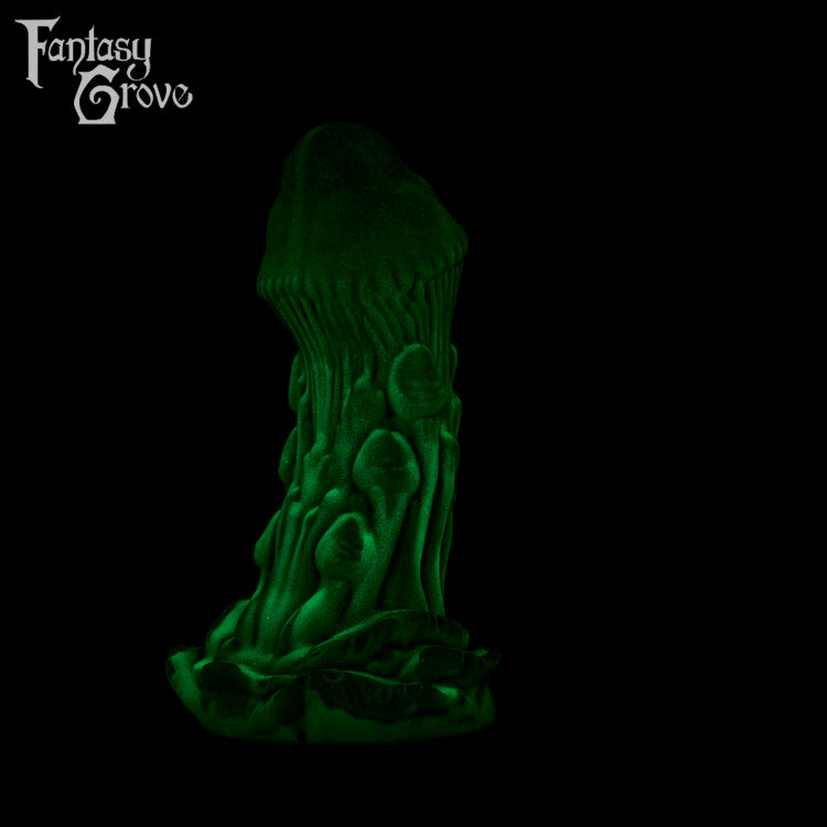 A fantasy sex toy on a black background with the Fantasy Grove logo in the upper left corner