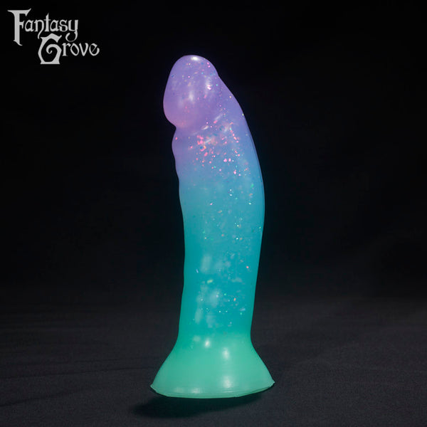 A Fantasy Grove sex toy on a black background with a logo in the upper left corner