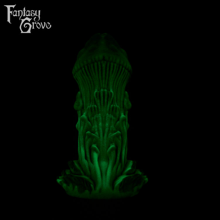 A fantasy sex toy on a black background with the Fantasy Grove logo in the upper left corner