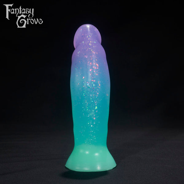 A Fantasy Grove sex toy on a black background with a logo in the upper left corner