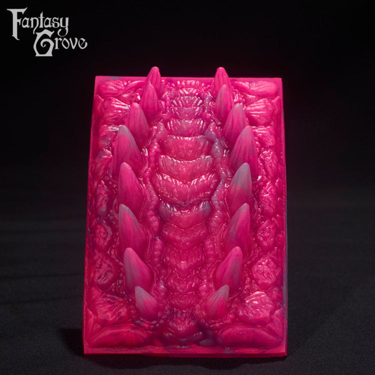 A fantasy sex toys on a black background with Fantasy Grove branding