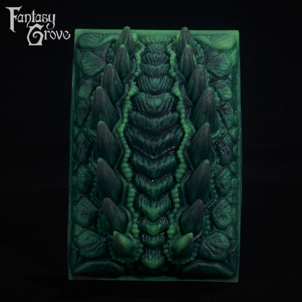 A fantasy sex toy on a black background with the Fantasy Grove logo in the upper left corner