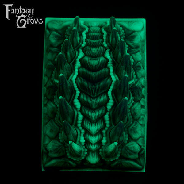 A fantasy sex toy on a black background with the Fantasy Grove logo in the upper left corner