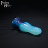 A Fantasy Grove sex toy on a black background with a logo in the upper left corner