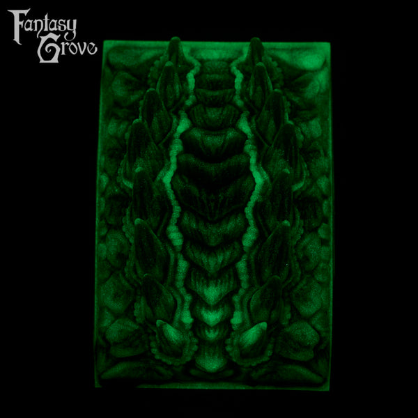 A fantasy sex toy on a black background with the Fantasy Grove logo in the upper left corner