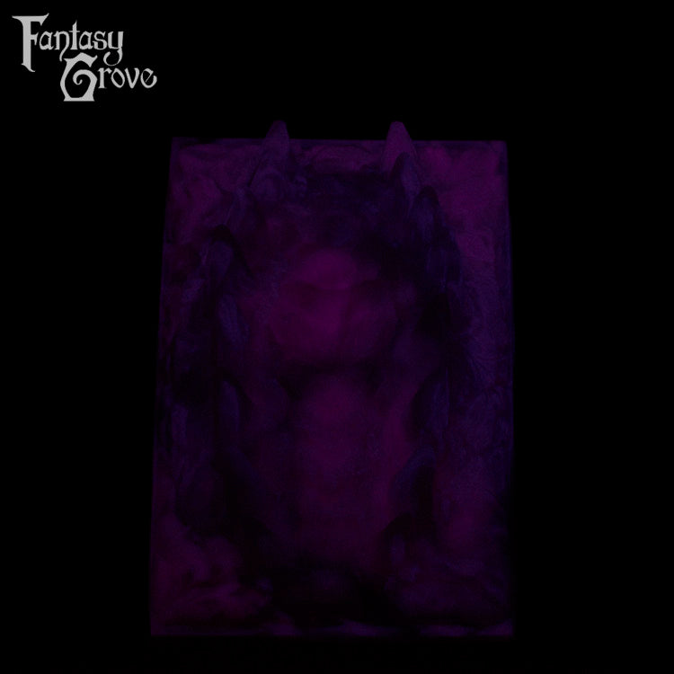 A fantasy sex toys on a black background with Fantasy Grove branding