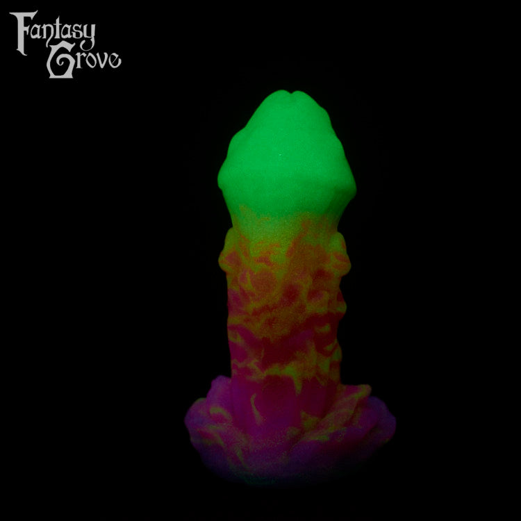A fantasy sex toy on a black background with the Fantasy Grove logo in the upper left corner 