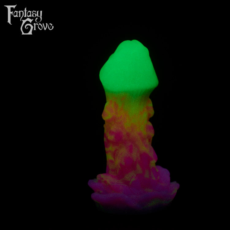 A fantasy sex toy on a black background with the Fantasy Grove logo in the upper left corner 