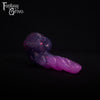 A fantasy sex toy on a black background with the Fantasy Grove logo in the upper left corner
