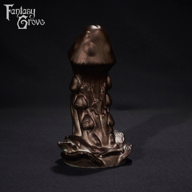 A fantasy sex toy on a black background with the Fantasy Grove logo in the upper left corner 