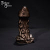 A fantasy sex toy on a black background with the Fantasy Grove logo in the upper left corner 