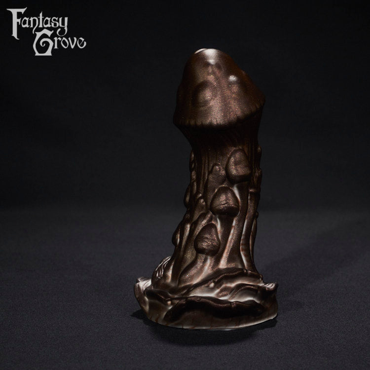 A fantasy sex toy on a black background with the Fantasy Grove logo in the upper left corner 