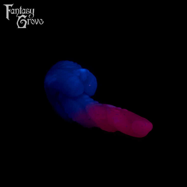 A fantasy sex toy on a black background with the Fantasy Grove logo in the upper left corner