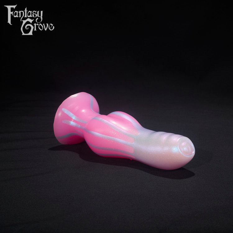 A Fantasy Grove sex toy on a black background with a logo in the upper left corner