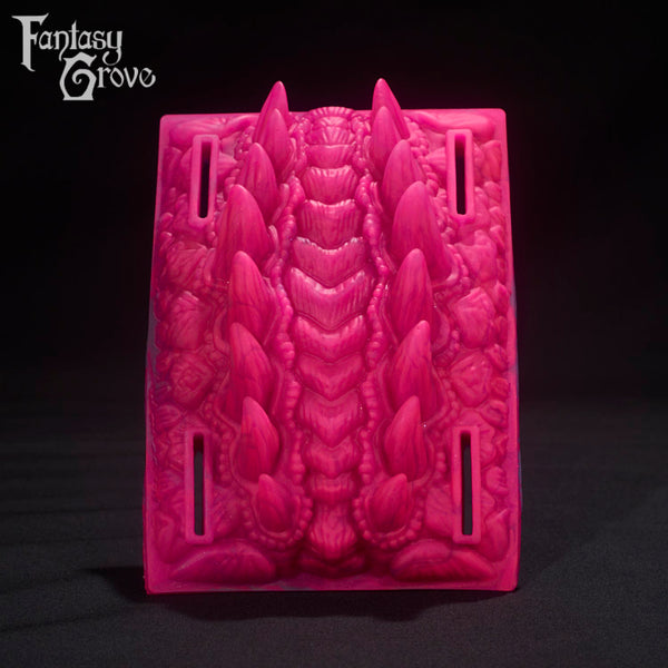 A fantasy sex toys on a black background with Fantasy Grove branding