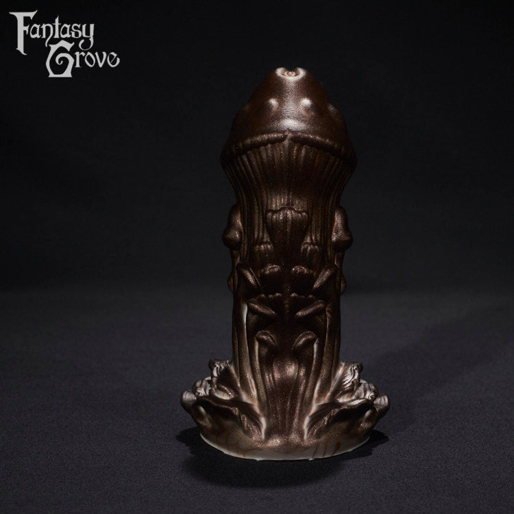 A fantasy sex toy on a black background with the Fantasy Grove logo in the upper left corner 