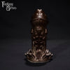 A fantasy sex toy on a black background with the Fantasy Grove logo in the upper left corner 