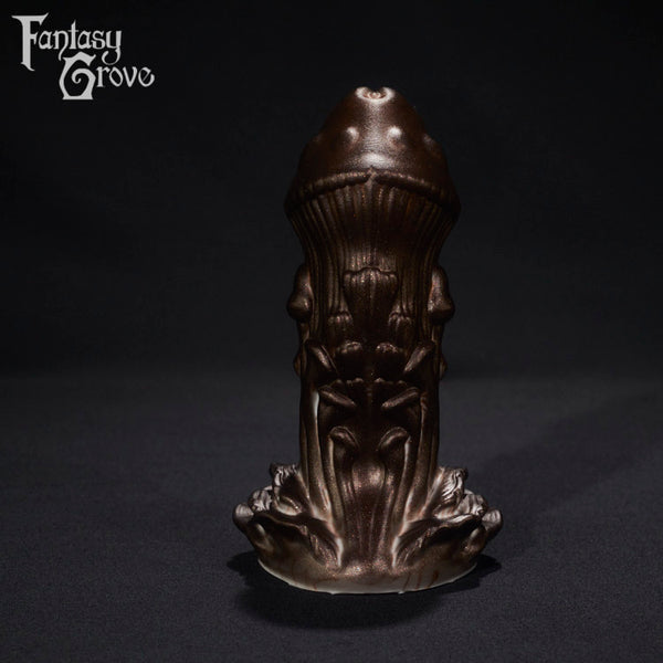A fantasy sex toy on a black background with the Fantasy Grove logo in the upper left corner 