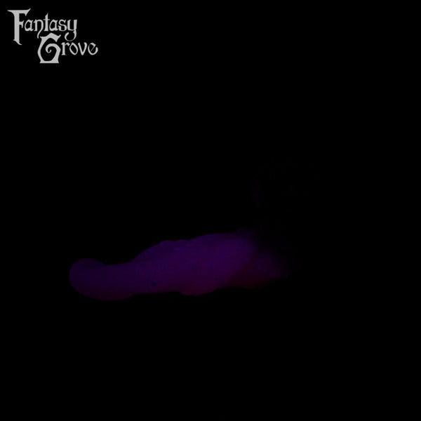 A fantasy sex toy on a black background with the Fantasy Grove logo in the upper left corner