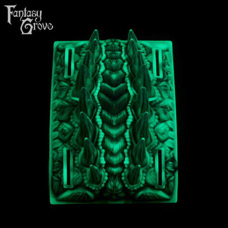 A fantasy sex toy on a black background with the Fantasy Grove logo in the upper left corner
