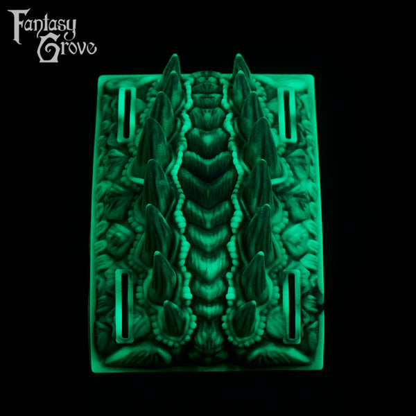 A fantasy sex toy on a black background with the Fantasy Grove logo in the upper left corner