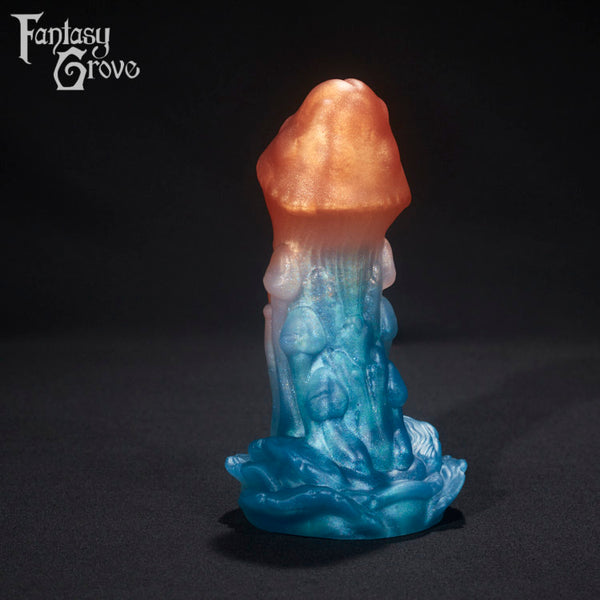 A fantasy sex toy on a black background with the Fantasy Grove logo in the upper left corner 