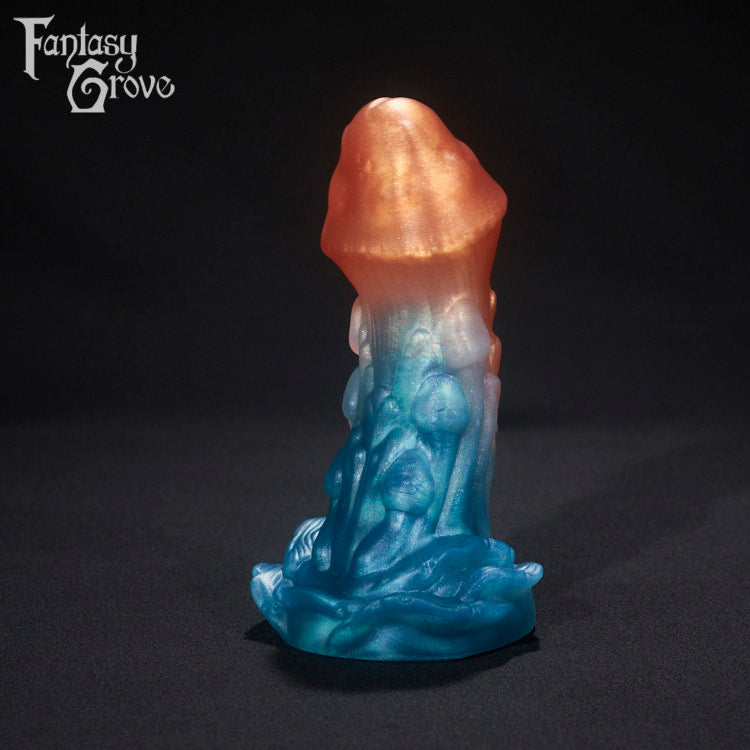 A fantasy sex toy on a black background with the Fantasy Grove logo in the upper left corner 