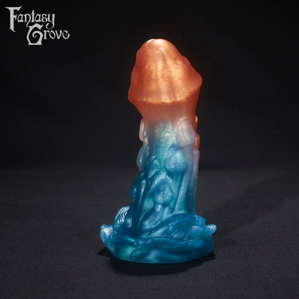 A fantasy sex toy on a black background with the Fantasy Grove logo in the upper left corner 