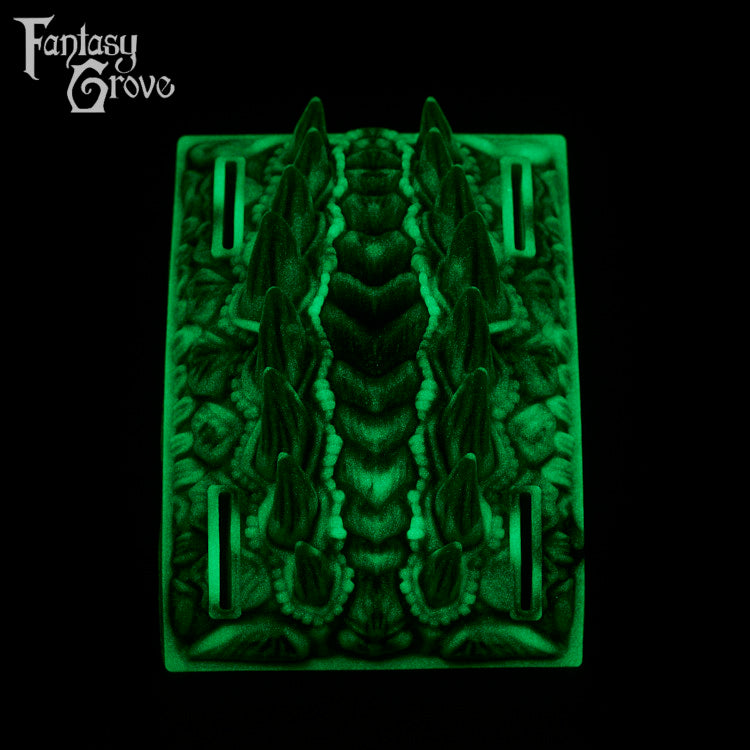 A fantasy sex toy on a black background with the Fantasy Grove logo in the upper left corner