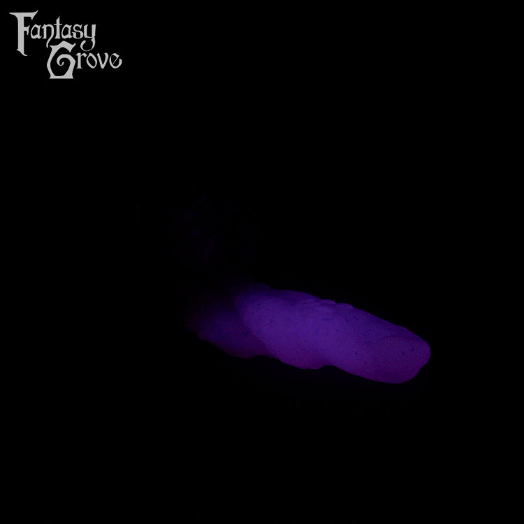 A fantasy sex toy on a black background with the Fantasy Grove logo in the upper left corner