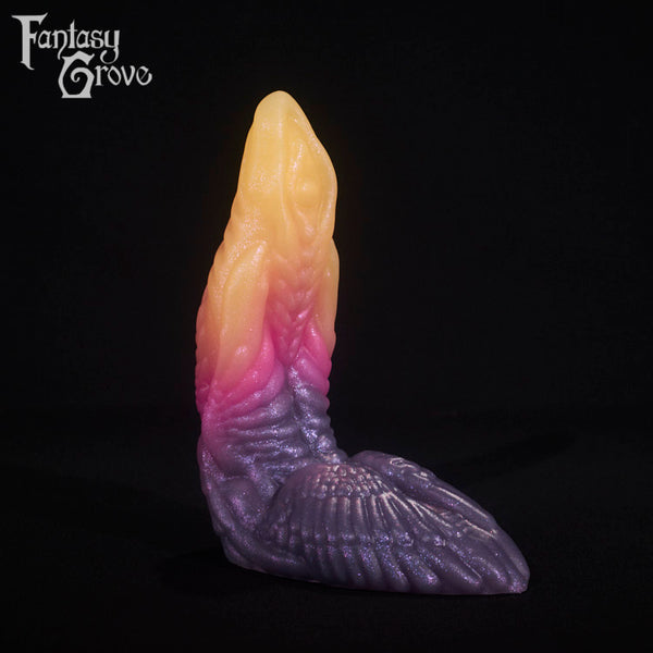 A fantasy sex toy on a black background with the Fantasy Grove logo in the upper left corner