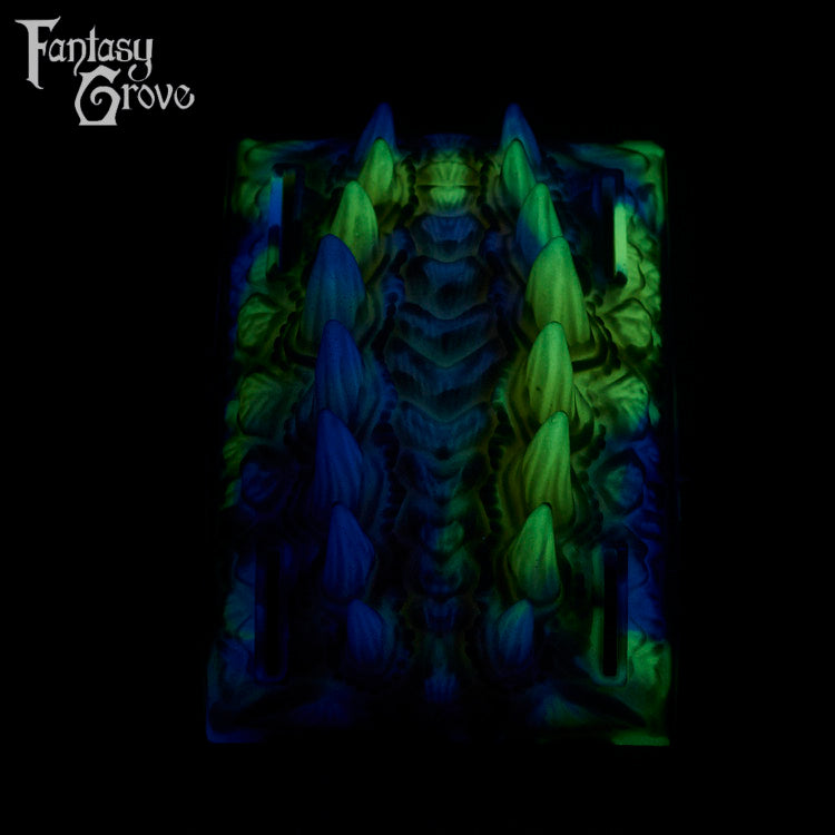 A fantasy sex toy on a black background with the Fantasy Grove logo in the upper left corner