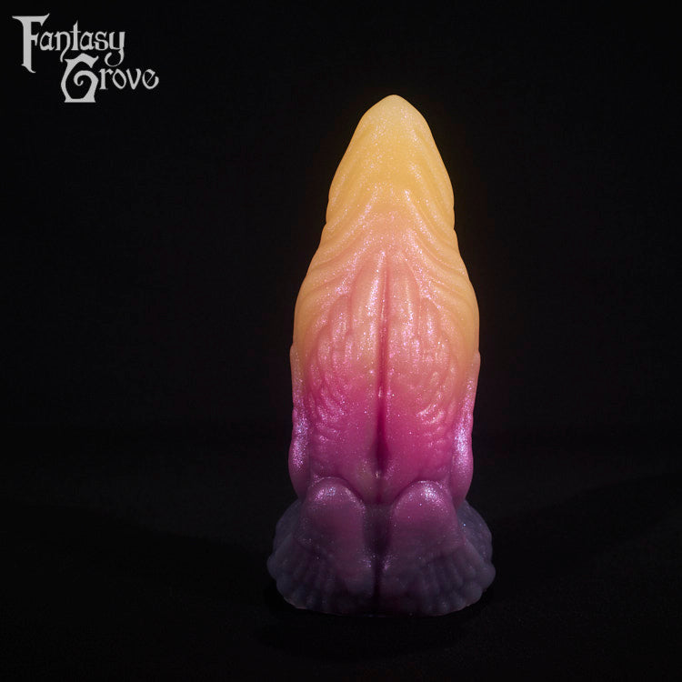 A fantasy sex toy on a black background with the Fantasy Grove logo in the upper left corner