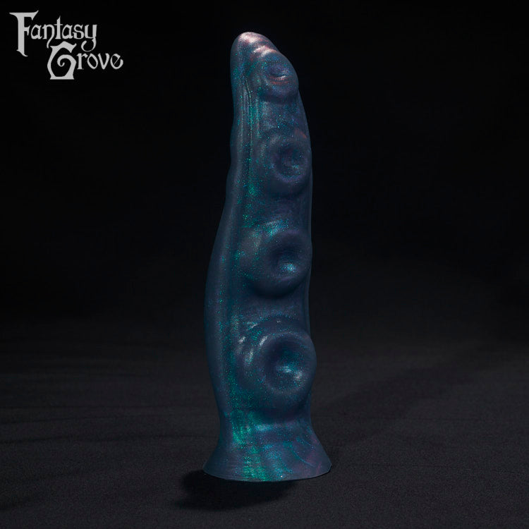 A Fantasy Grove sex toy on a black background with a logo in the upper left corner