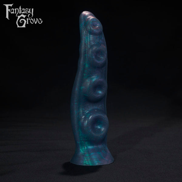 A Fantasy Grove sex toy on a black background with a logo in the upper left corner