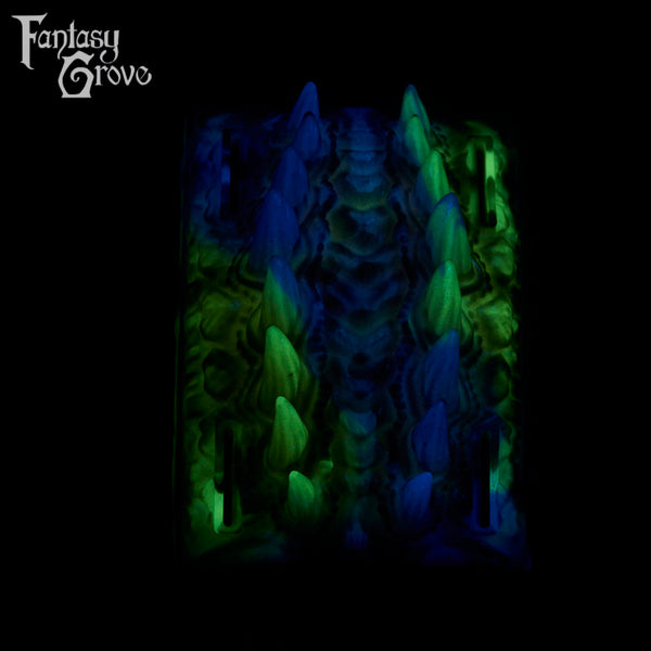 A fantasy sex toy on a black background with the Fantasy Grove logo in the upper left corner