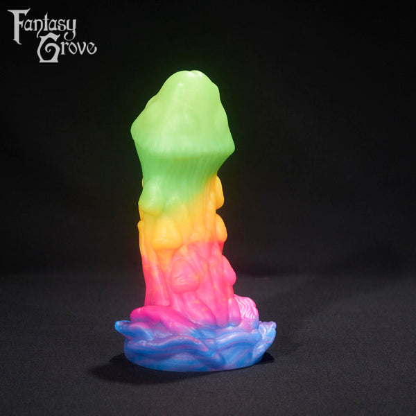 A fantasy sex toy on a black background with the Fantasy Grove logo in the upper left corner 