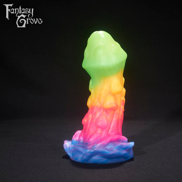 A fantasy sex toy on a black background with the Fantasy Grove logo in the upper left corner 
