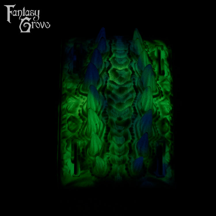 A fantasy sex toy on a black background with the Fantasy Grove logo in the upper left corner