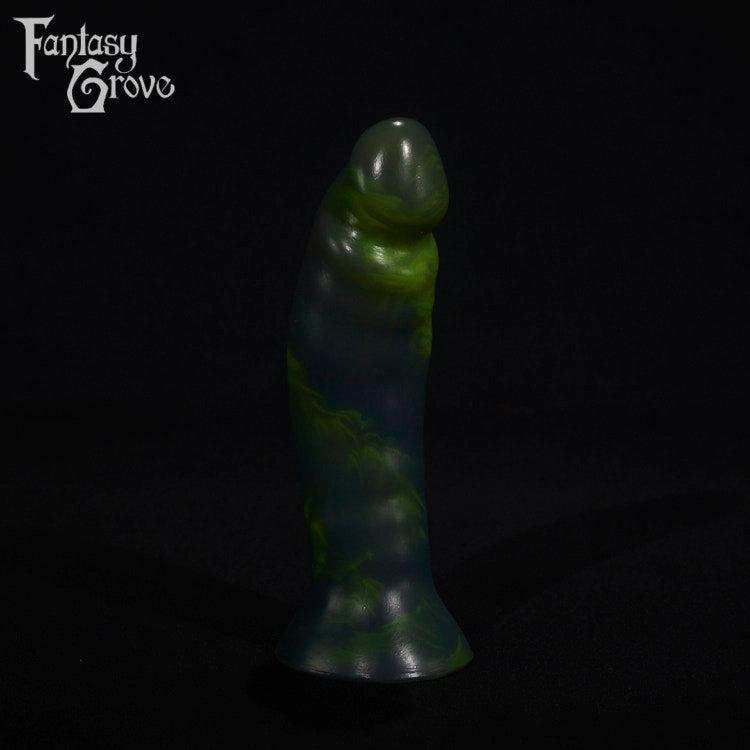 A fantasy sex toy on a black background with the Fantasy Grove logo in the upper left corner