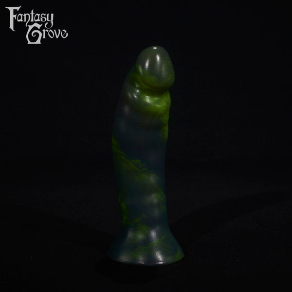 A fantasy sex toy on a black background with the Fantasy Grove logo in the upper left corner