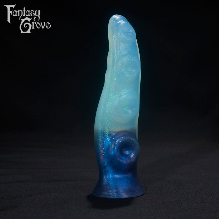 A Fantasy Grove sex toy on a black background with a logo in the upper left corner