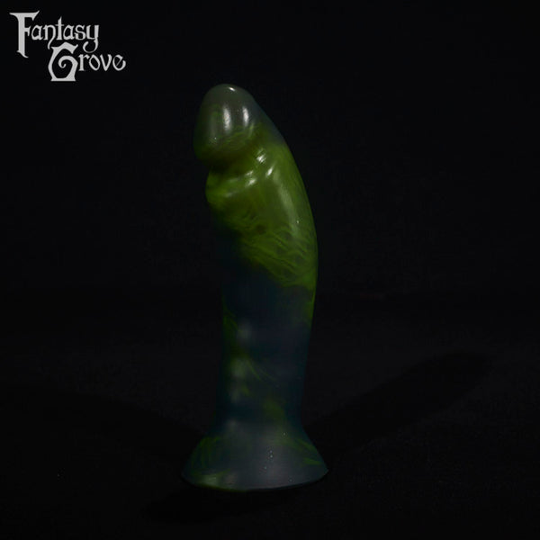 A fantasy sex toy on a black background with the Fantasy Grove logo in the upper left corner