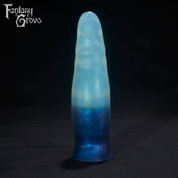 A Fantasy Grove sex toy on a black background with a logo in the upper left corner