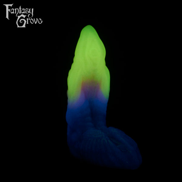 A fantasy sex toy on a black background with the Fantasy Grove logo in the upper left corner