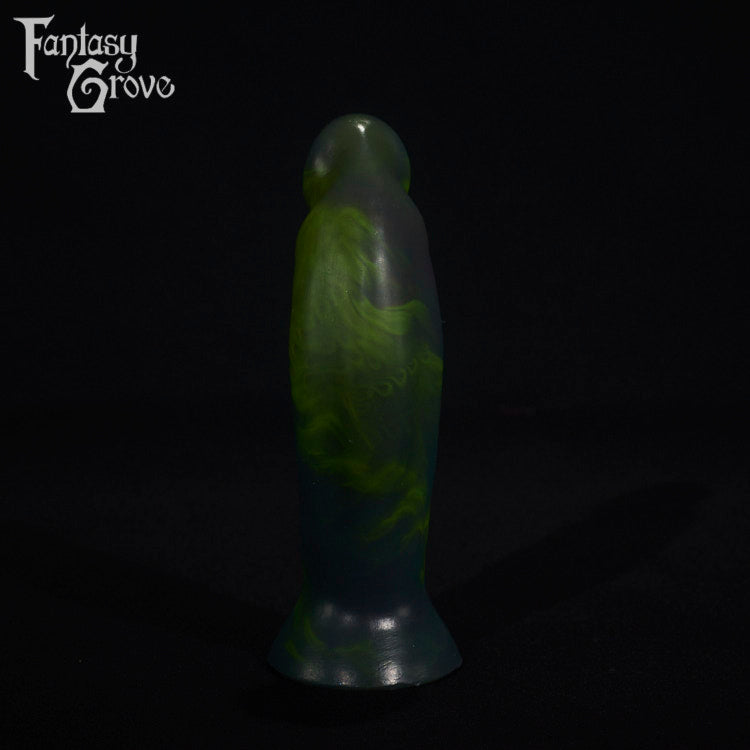 A fantasy sex toy on a black background with the Fantasy Grove logo in the upper left corner