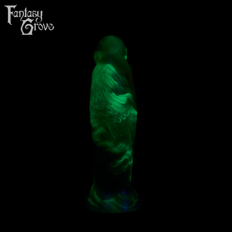 A fantasy sex toy on a black background with the Fantasy Grove logo in the upper left corner