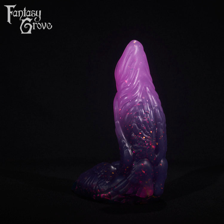 A fantasy sex toy on a black background with the Fantasy Grove logo in the upper left corner